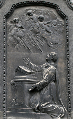 Istenes Szent János, az Irgalmas rend alapítója  - Mayer Ede domborműve (1905)